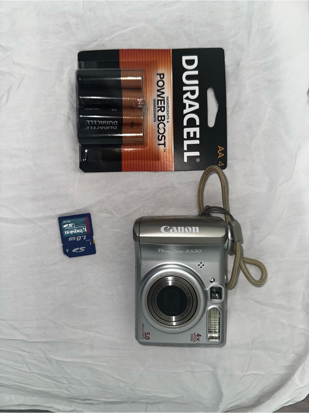 Canon PowerShot A530 Digital Camera in Silver with Wrist Strap - Picture 1 of 3
